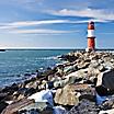 Two lighthouses at the entrance of the harbor in Warnemunde, Germany