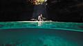 Couple on their Cruise Vacation Inside of a Cenote, Cozumel, Mexico 