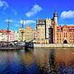 Coastal view of old town and a vintage ship in Gdansk, Poland