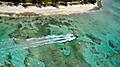 Helicopter view of a Caribbean speed boat tour. The Caribbean.