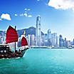 A boat sailing through Hong Kong harbor