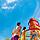 Couple looking at Daredevils Peak, Perfect Day CocoCay | HP Mobile