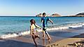 Kids Playing Running at the Beach