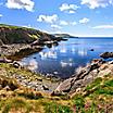 Coast terrain and a secluded bay in Scotland