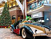 Presents and Christmas Decorations around Vintage Car