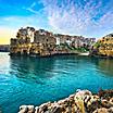 Polignano a Mare village on the rocks at sunrise, Bari, Apulia