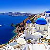 Classic white and blue houses of Oia in Santorini, Greece