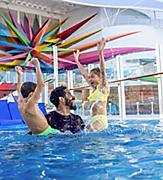 star of the seas royal bay pool father with children splashing