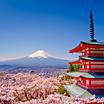 The upper levels of Chureito Red Pagoda with Mount Fuji in the distance