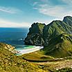 a view of mountains and sea in Al Mughsail Salalah, Sultanate of Oman