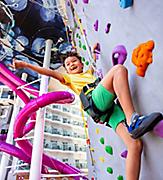 Rock Climbing Wall Boy Almost Reaching the Bell